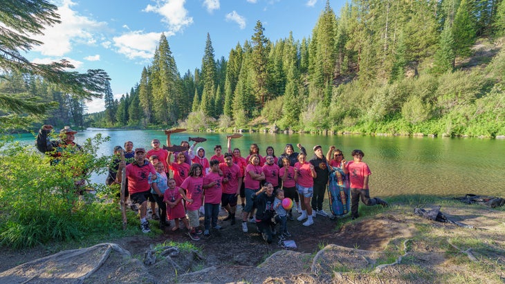 Families and community members celebrate the Salmon Run, an annual event where participants run from the mouth of the Klamath to one of its headwaters.