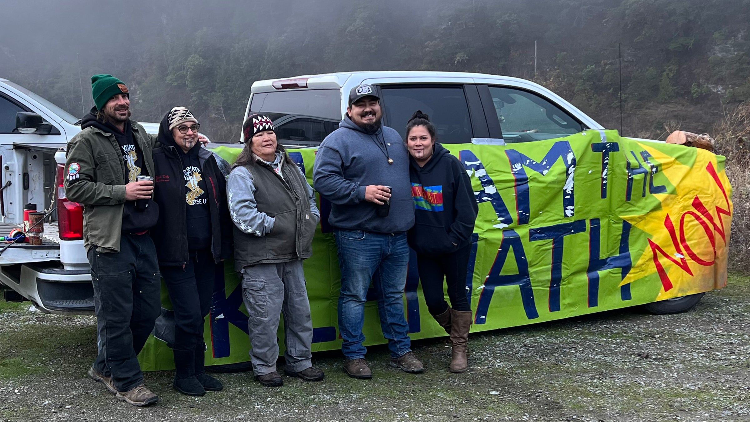 Chook-Chook Hillman, Annelia Hillman, Hoopa elder Dania Rose Colegrove, and Frankie and Molli Myers celebrate the dam removal by the Klamath River.