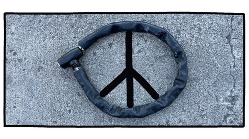 PHOTO OF ROUND BIKE LOCK FORMING PEACE SIGN