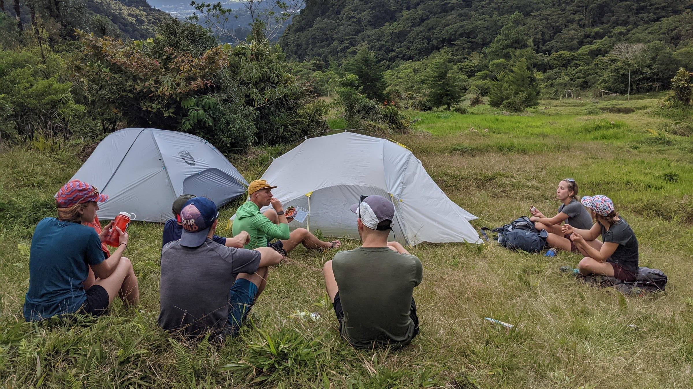 campers sitting on ground