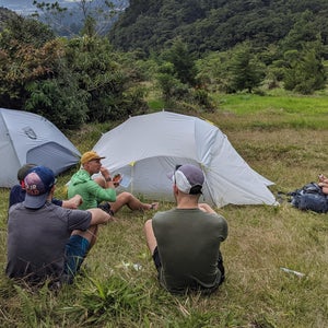 campers sitting on ground