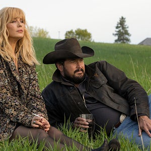 Rip and Beth sitting on the grass