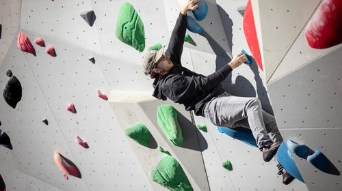 A man climbing in Boyce Bouldering Park, in Allegheny County