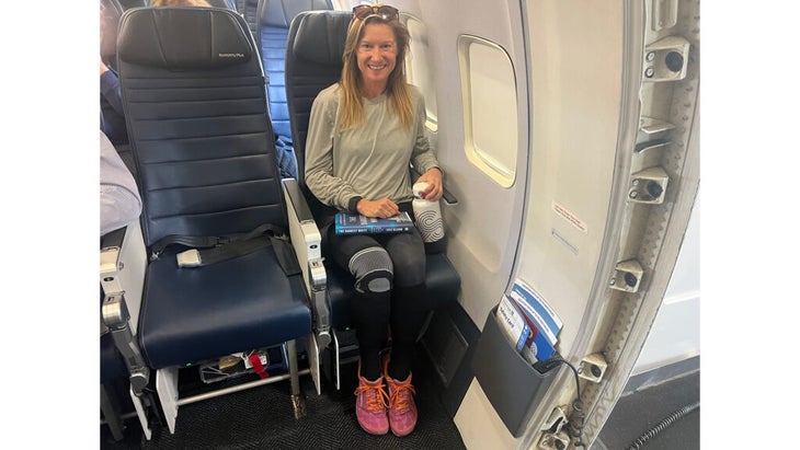 woman on an airplane in her seat