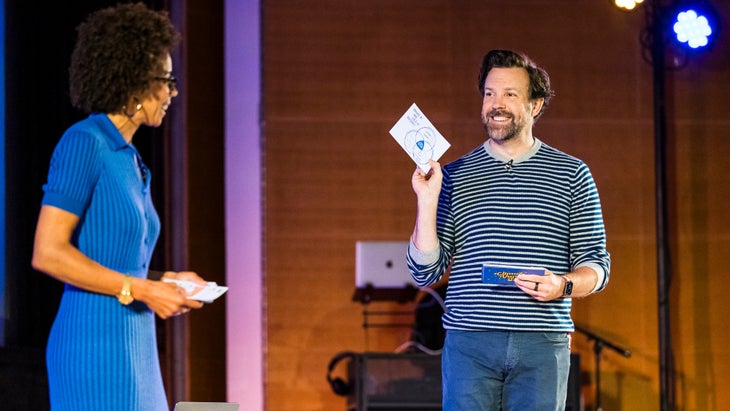 Jason Sudeikus and Ayana Elizabeth Johnson on stage at the Climate Variety Show during the What If We Get It Right? book tour