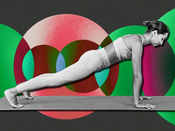 woman doing a pushup on a mat as part of a bodyweight workout plan over a graphic background of circles