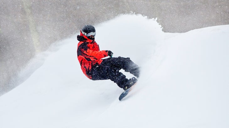 Snowboarder in powder in West Virginia