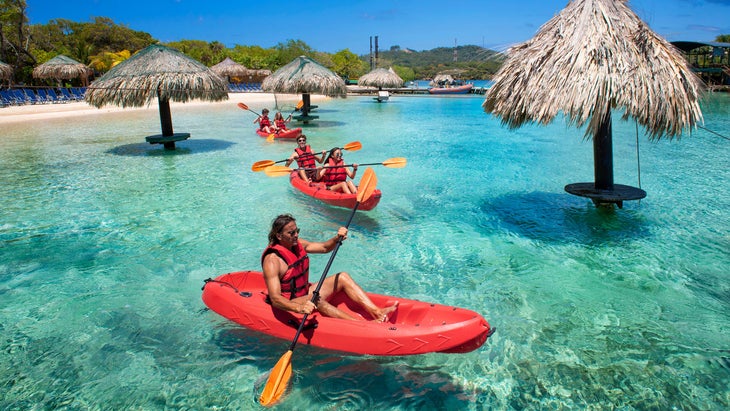 people kayaking in Honduras