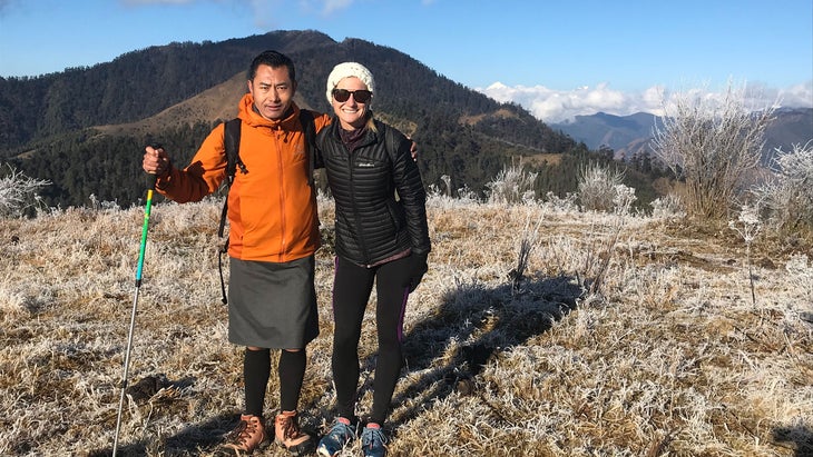 Jen Murphy, author, in Bhutan on a hike with her guide