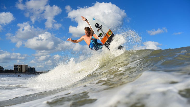 surfer catching a wave at Cocoa Beach in Florida