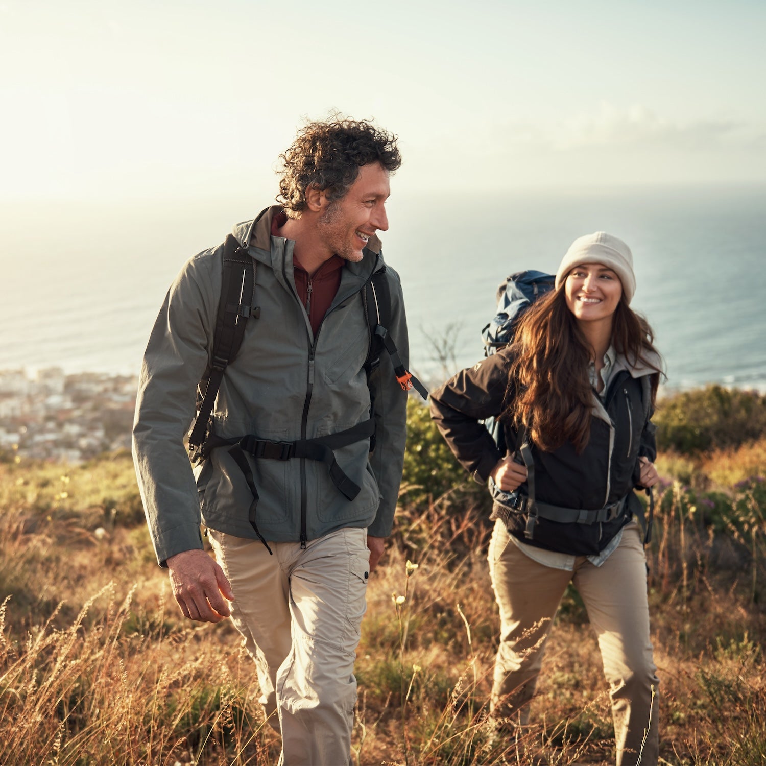 Shot of a couple going for a hike up the mountain