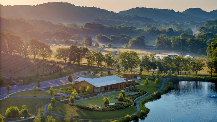 mists over lake and lodge at Southall Farm and Inn, in Franklin, Tennessee