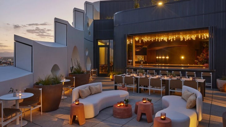 The rooftop terrace at the Populus hotel in downtown Denver has views west to the Front Range. 