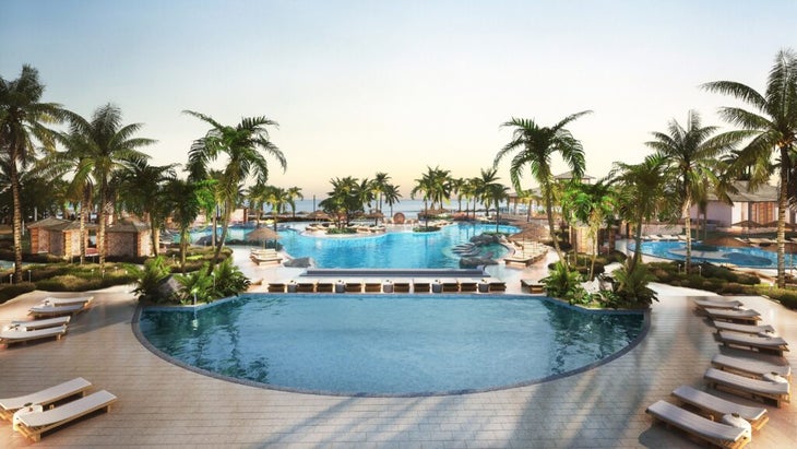 A view of the palm-circled pools and bay at the new South Caicos Resort Salterra