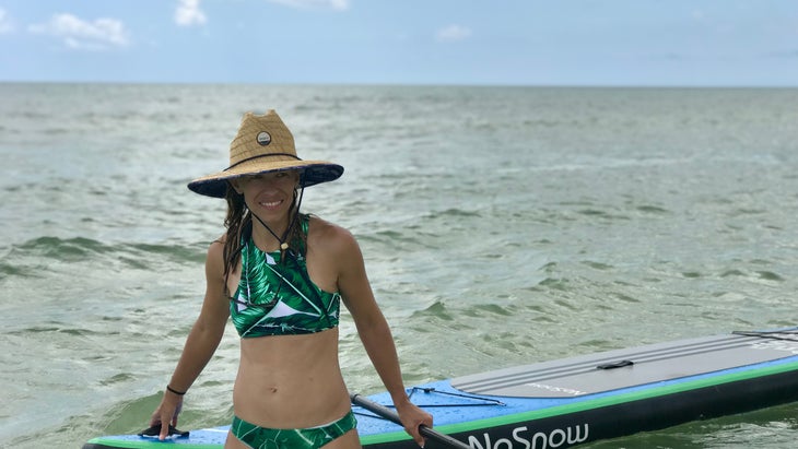 woman paddleboarding, Gulf Islands National Seashore