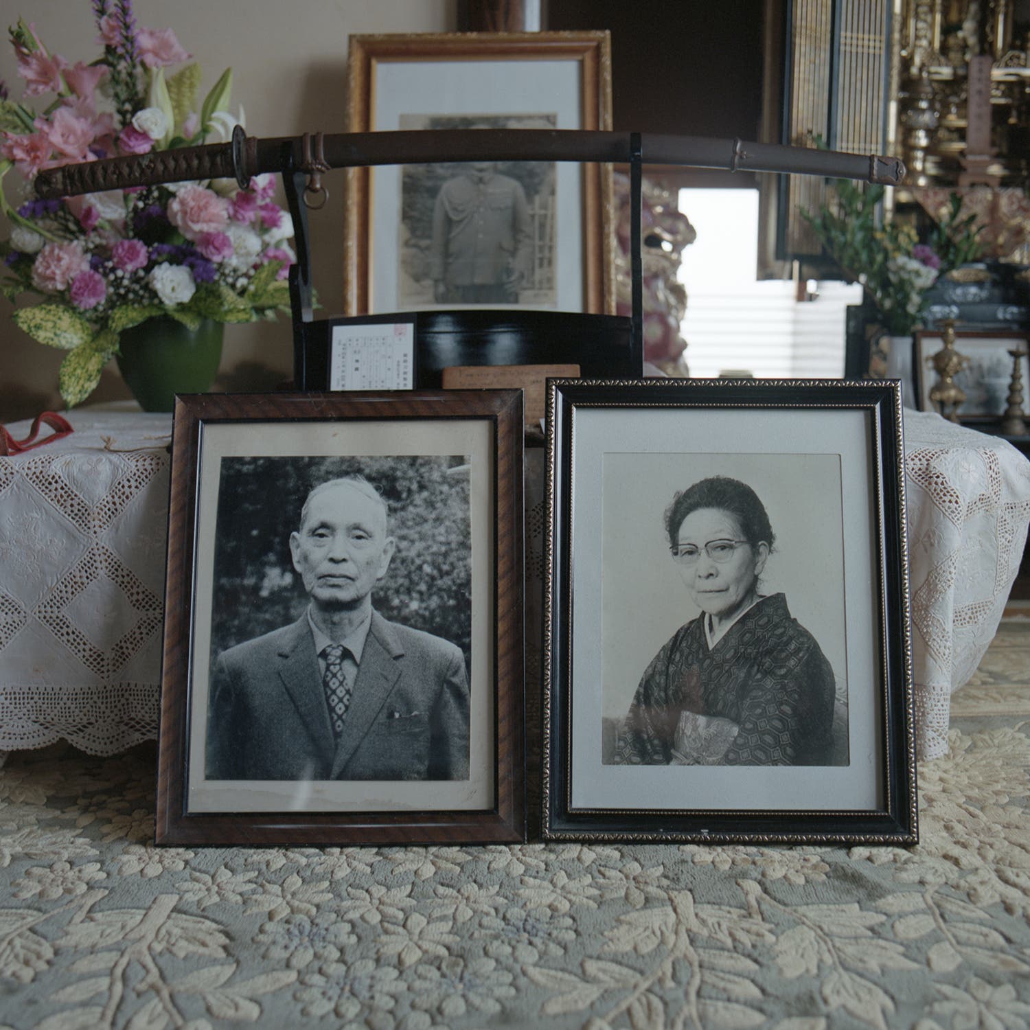 The lost sword on display above photos of Tomesuke Umeki and his wife, Ura