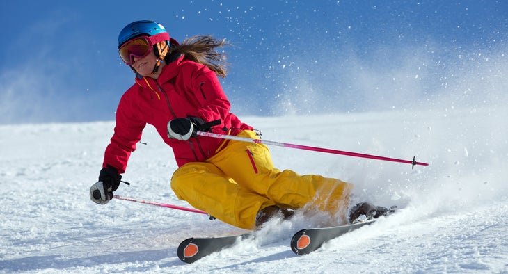 woman downhill skiing