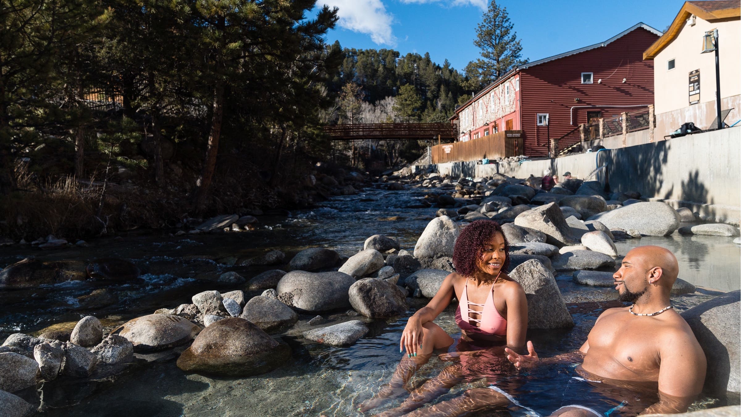 Mount Princeton Hot Springs couple soaking near river