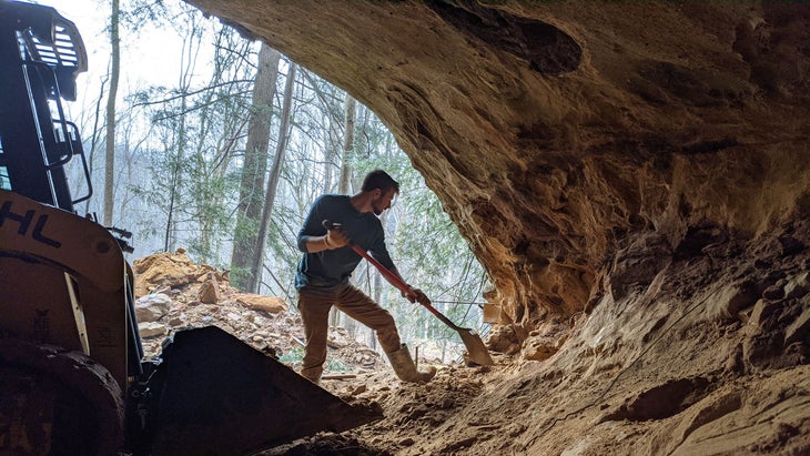 Bryant Gingerich digging out areas of Dunlap Hollow Ohio Cave Airbnb