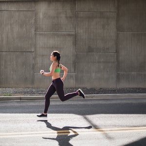 woman running on street