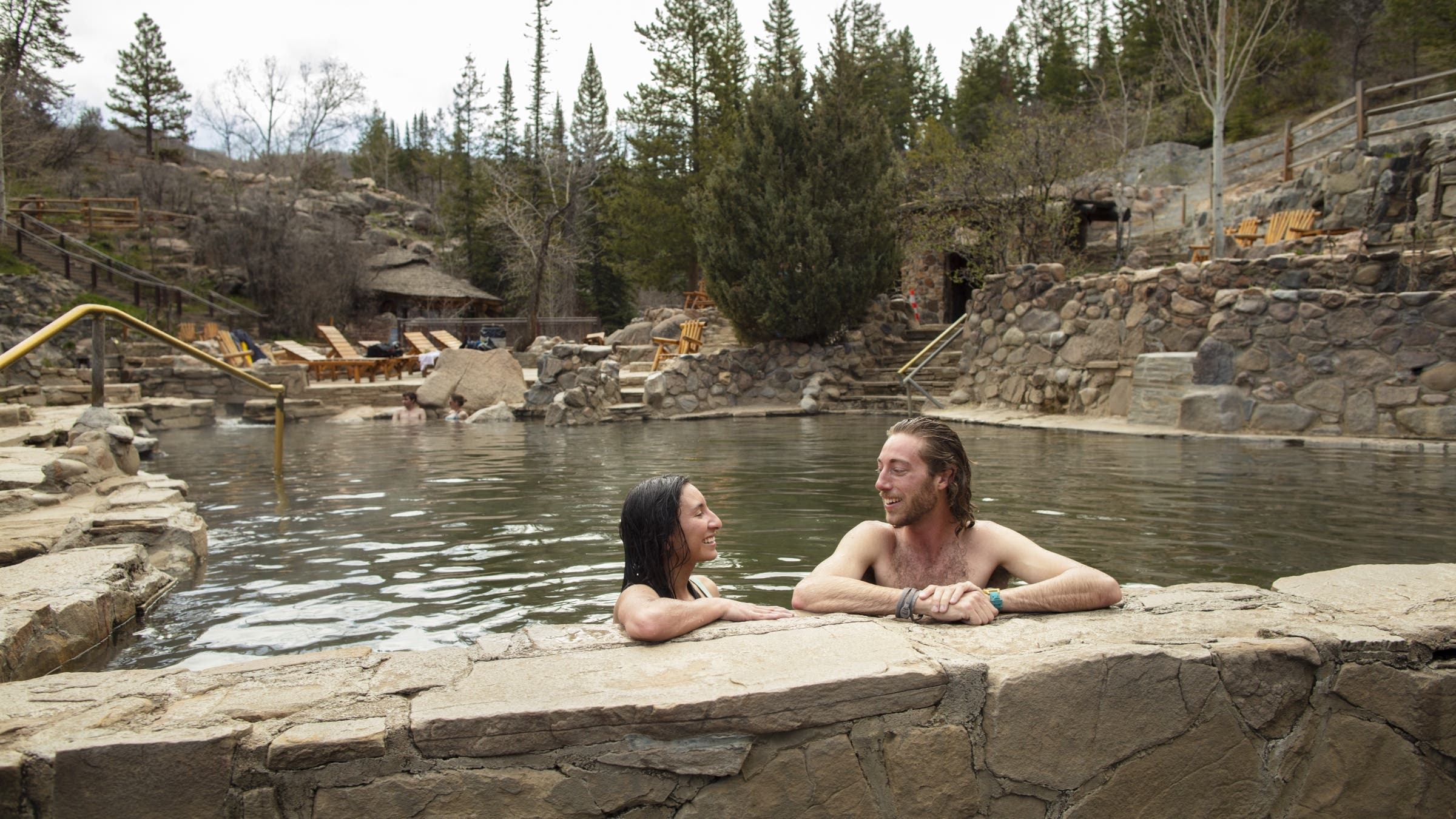 Couple soaking in Strawberry Park hot springs
