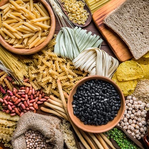 collage of beans, pasta, bread, and other carb-heaby foods