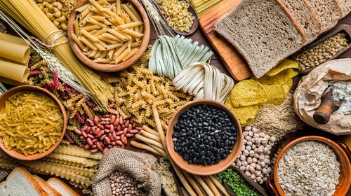 collage of beans, pasta, bread, and other carb-heaby foods