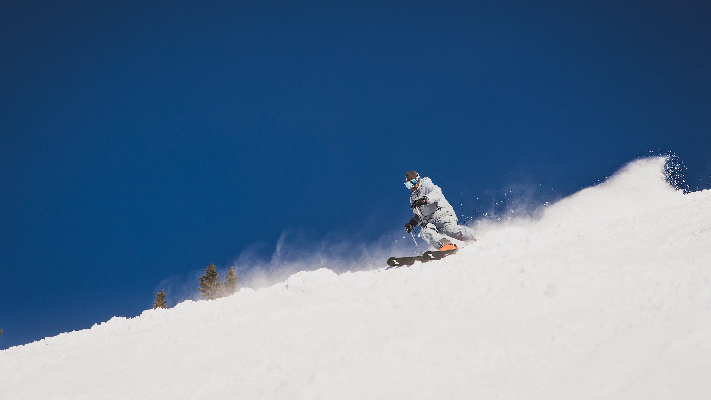 man skiing on blue sky day