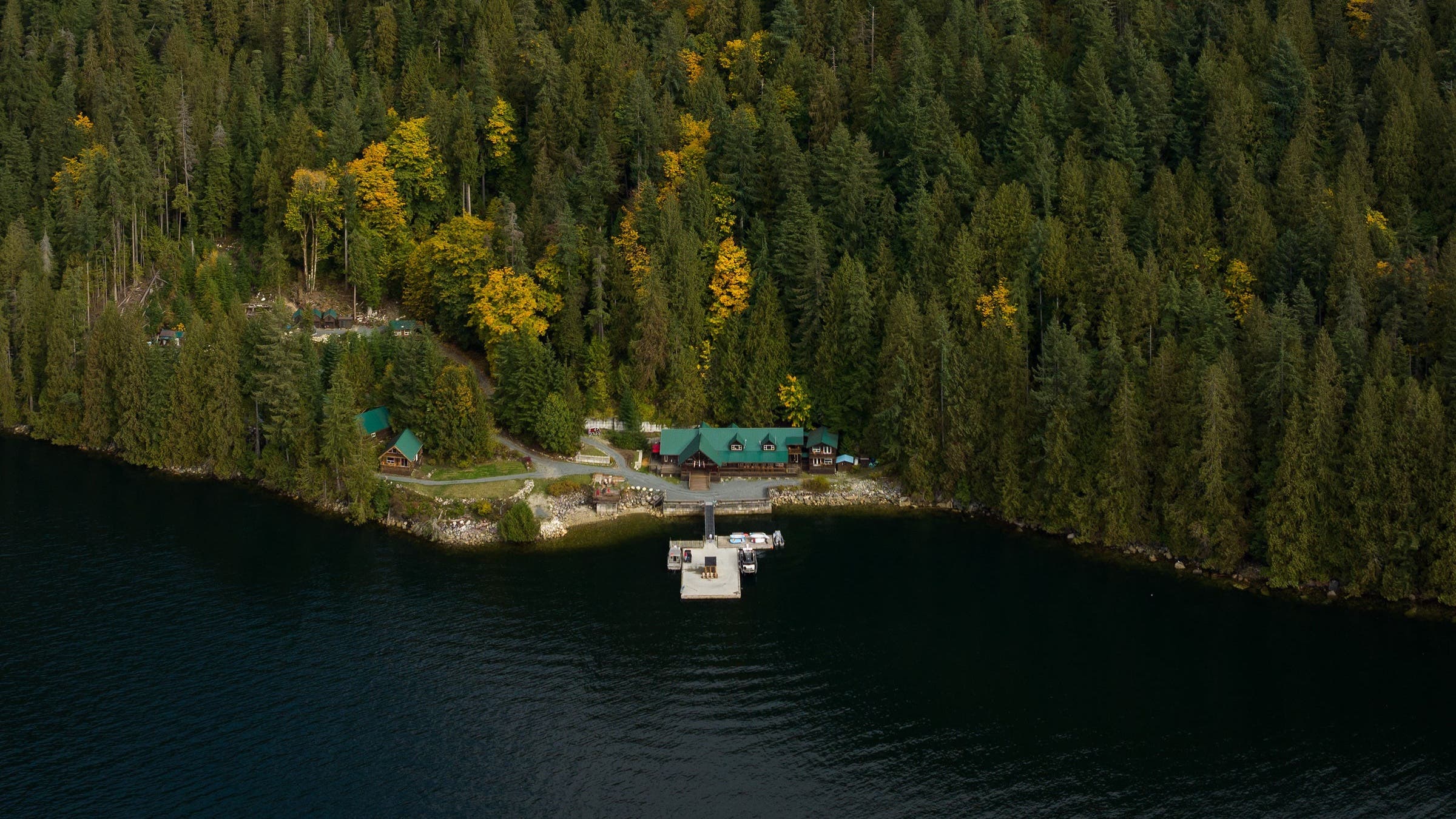 overhead shot of cabin on lake