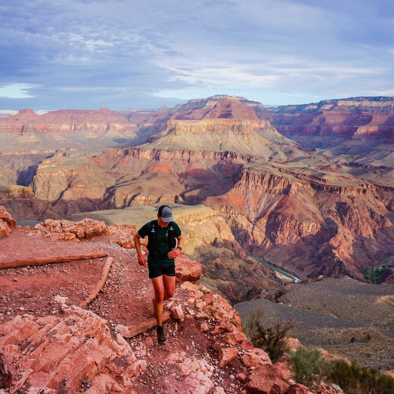 man running on red rock