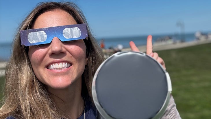 author posing with elipse glasses on