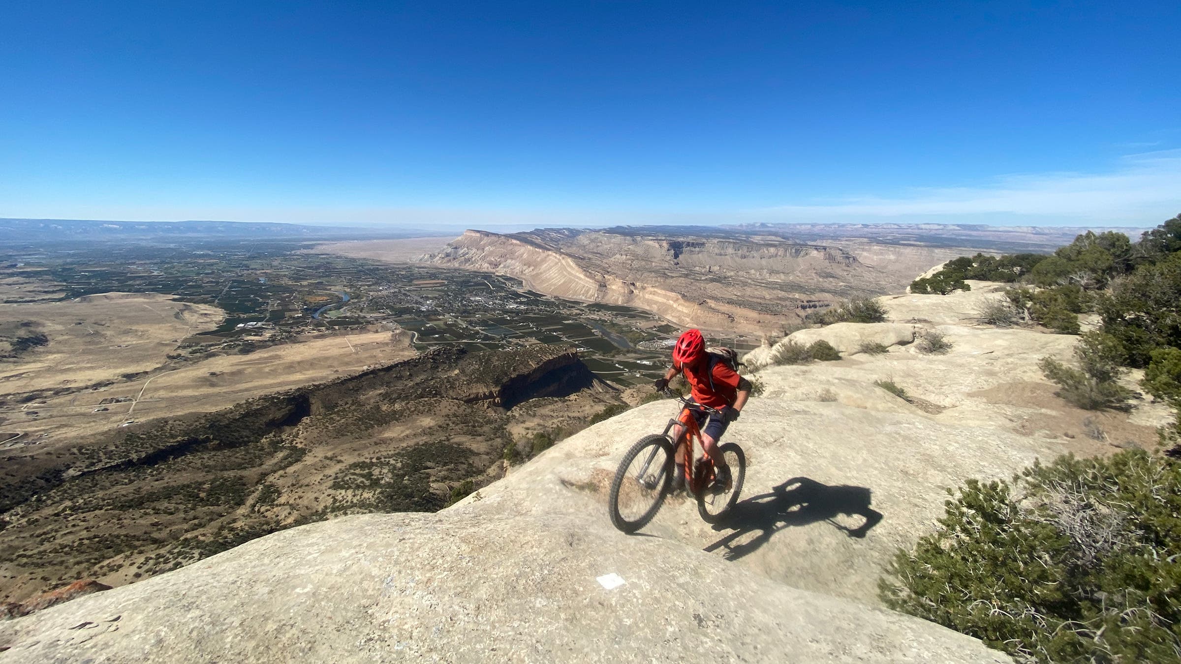 rider on the Palisade Plunge stopping for a mountain bike lap along one of the best road trips in the southwest
