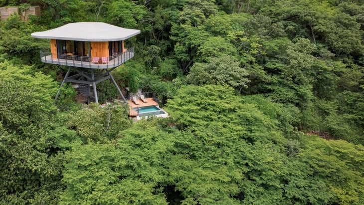 An aerial view of Suitree Experience’s treetop suite with private pool 