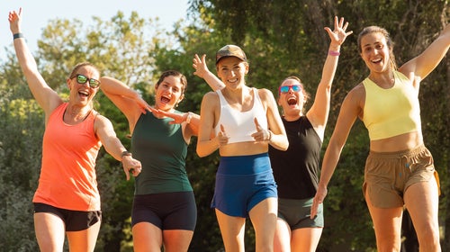 Arielle Knutson celebrating with group of athletic women
