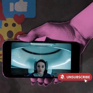 Pink hand holding an iPhone with a screen grab from Netflix apple cider vinegar cider series, mixed emoji reactions, and a red unsubscribe button; on a dark charcoal grey background