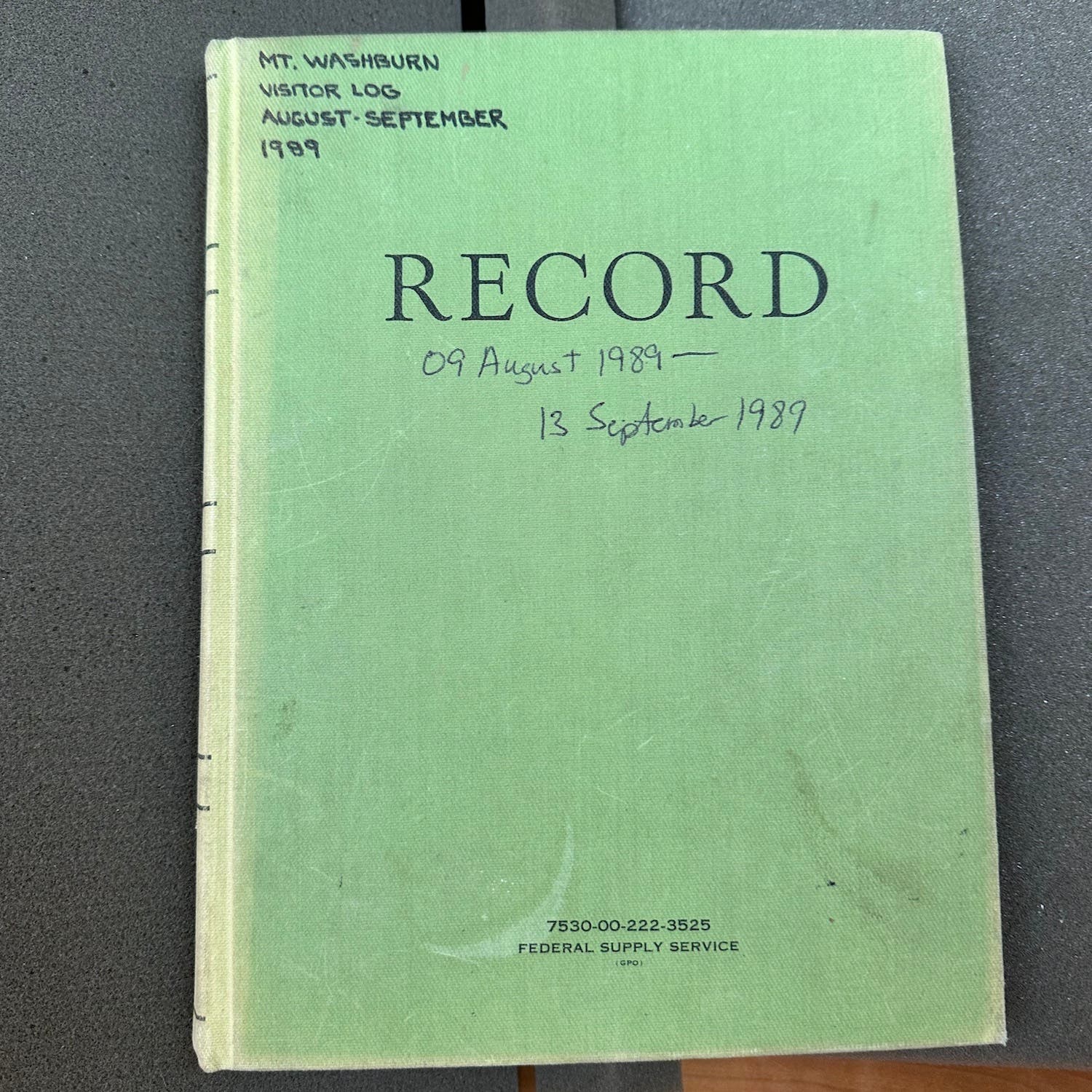 green cover of logbook