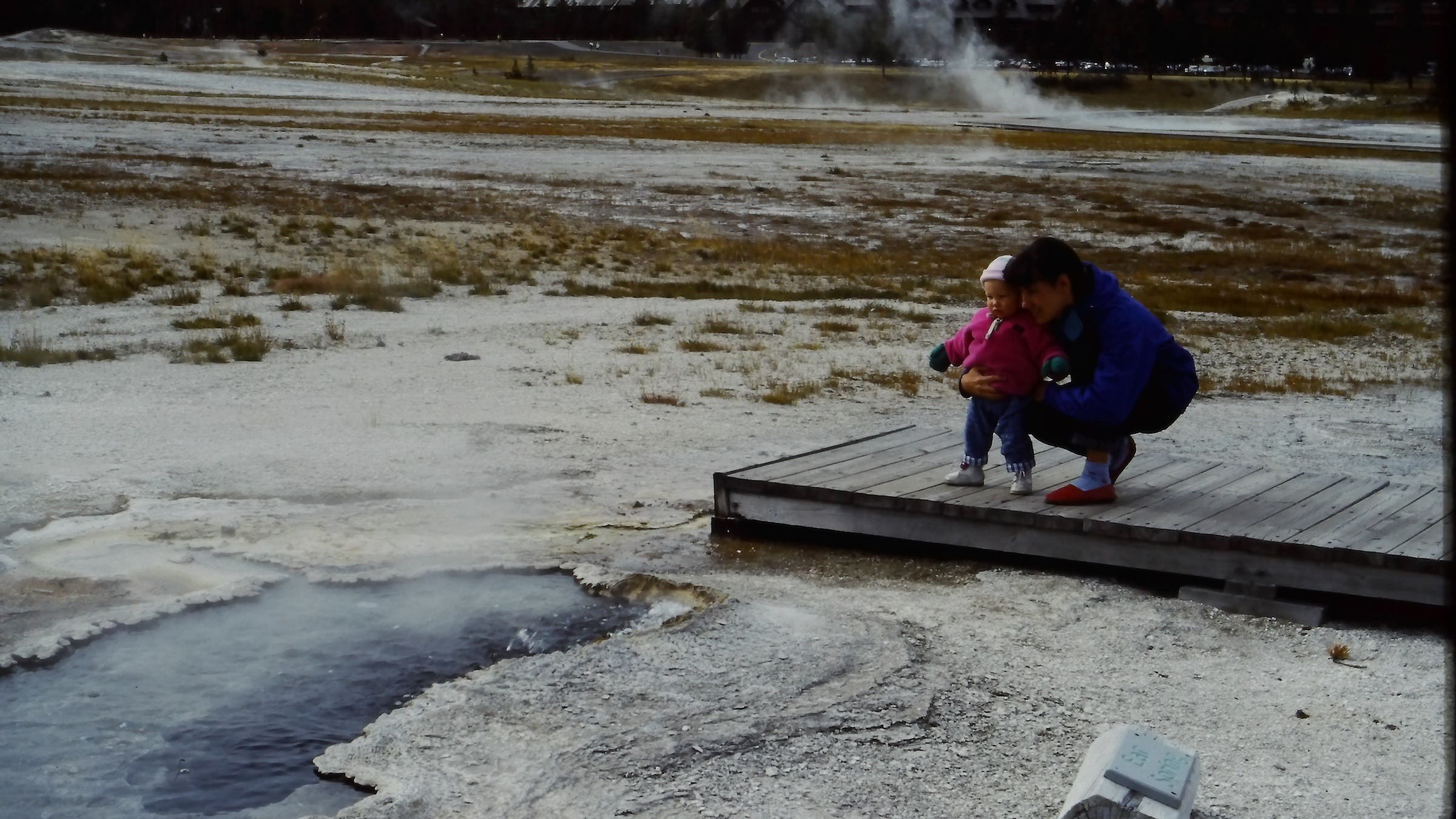 woman with toddler at geyser