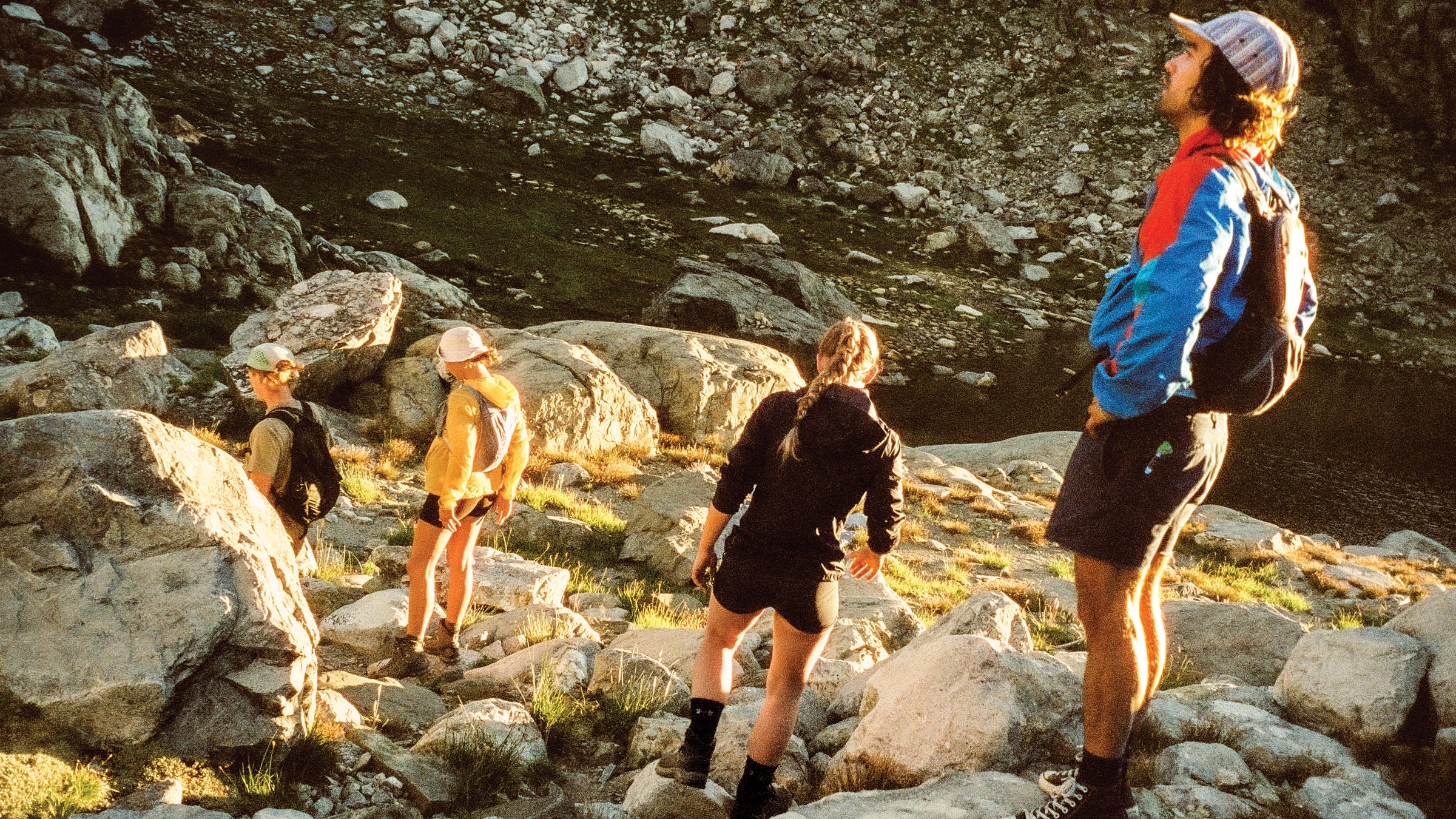 hikers near a river