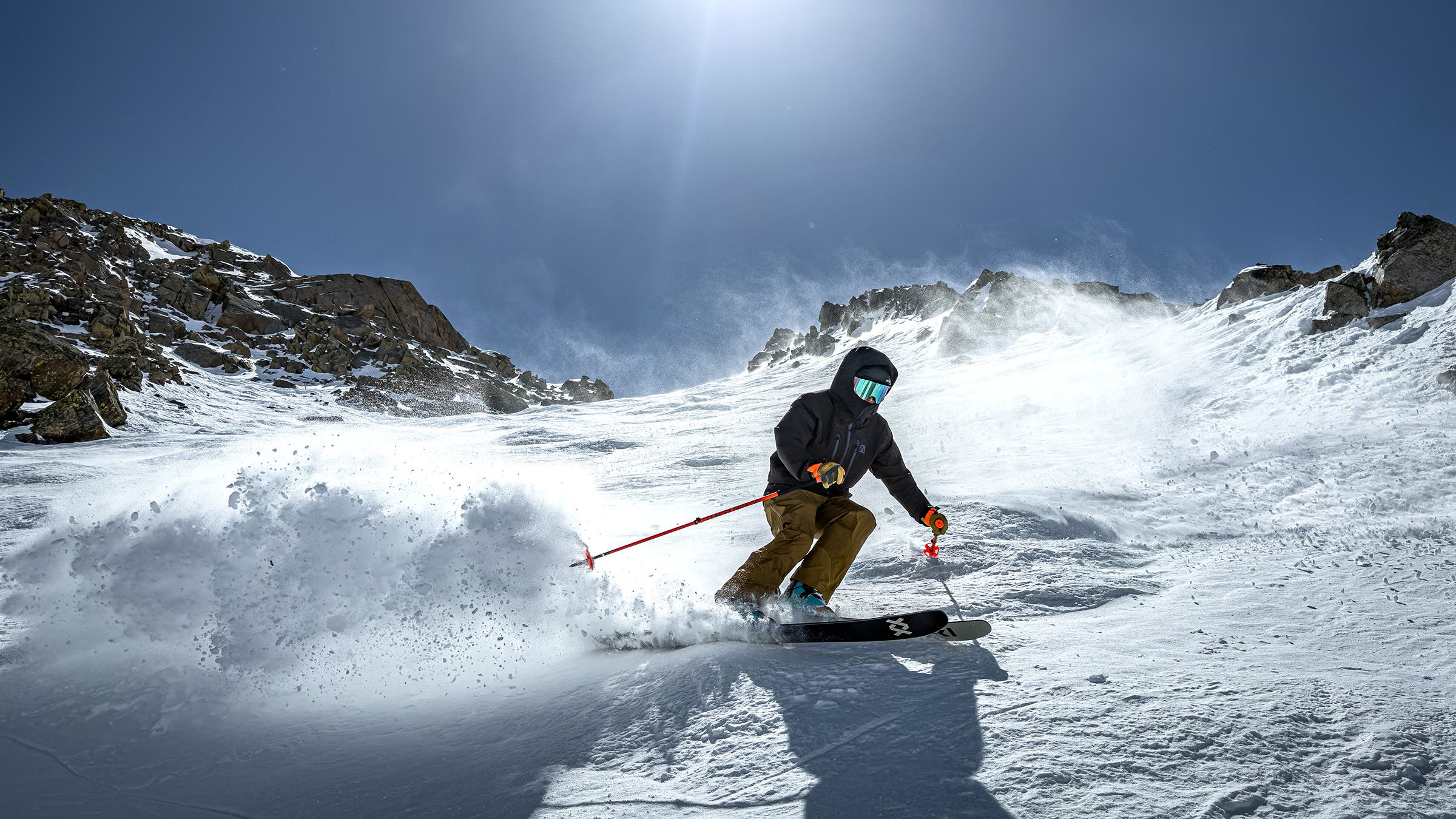 Skiier bundled up with hood