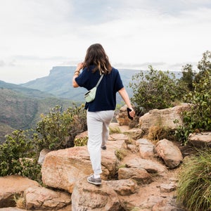 Young tourist exploring The Three Rondavels, Mpumalanga, South Africa while wearing sweat pants