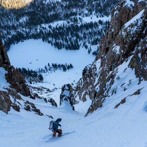 The author staring down the barrel of a steep couloir on the WNDR Intention 108