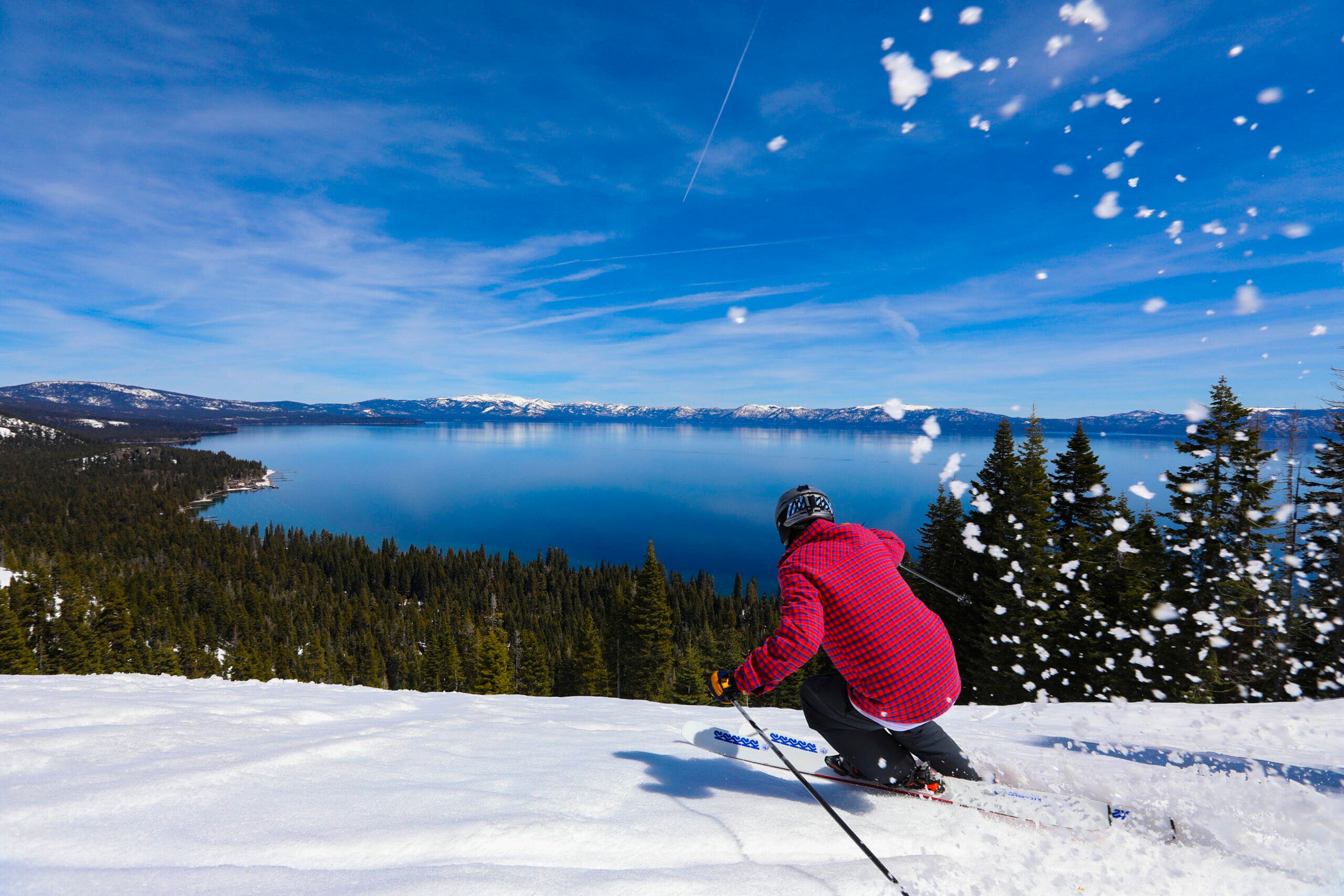 George Hjelte skis an empty Homewood Ski Area in the spring sun.