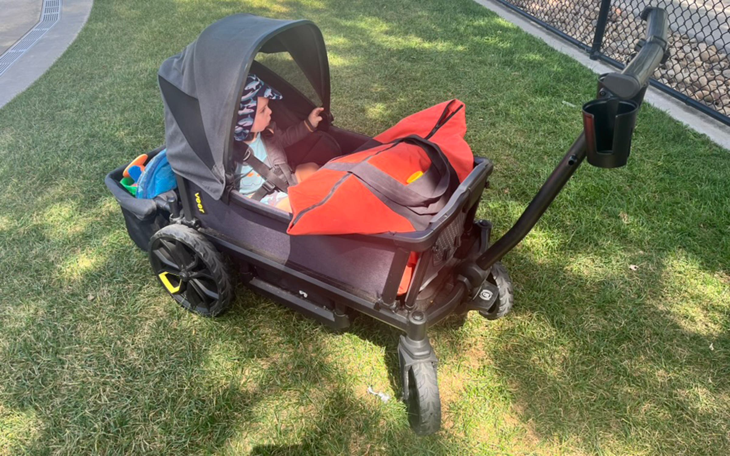Veer All Terrain Cruiser Wagon with kid and beach bag
