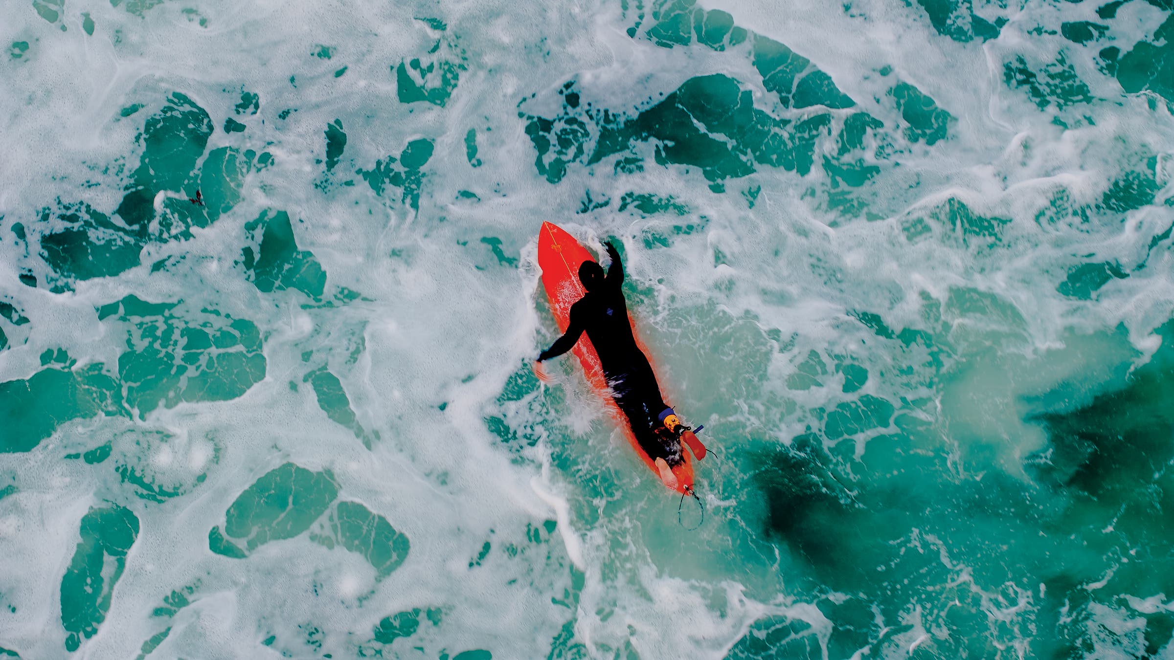 Surfing at Black’s Beach.
