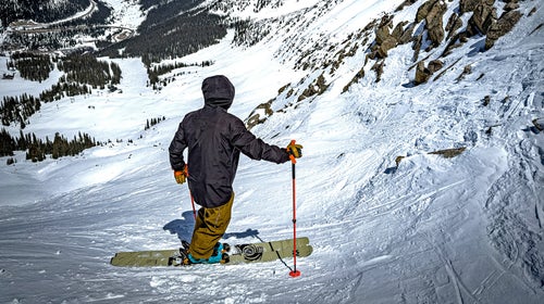 Flylow hood on skier