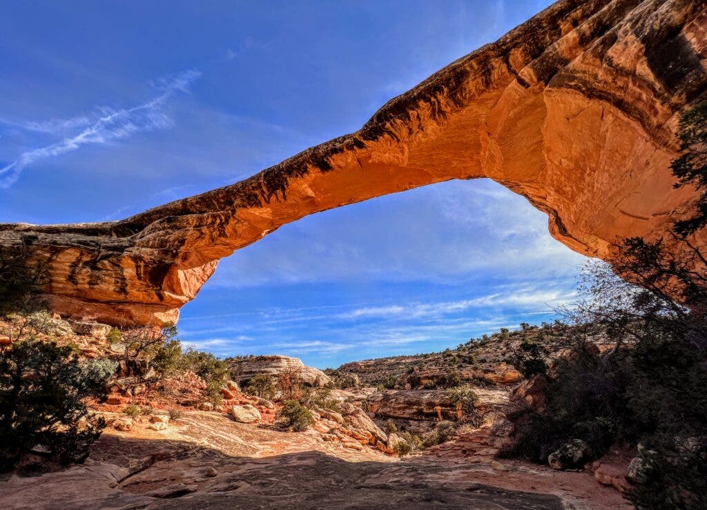 a sandstone bridge with black varnish