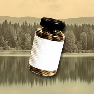 A pill prescription bottle on a lake and forest background to show that you can store medication while hiking or camping