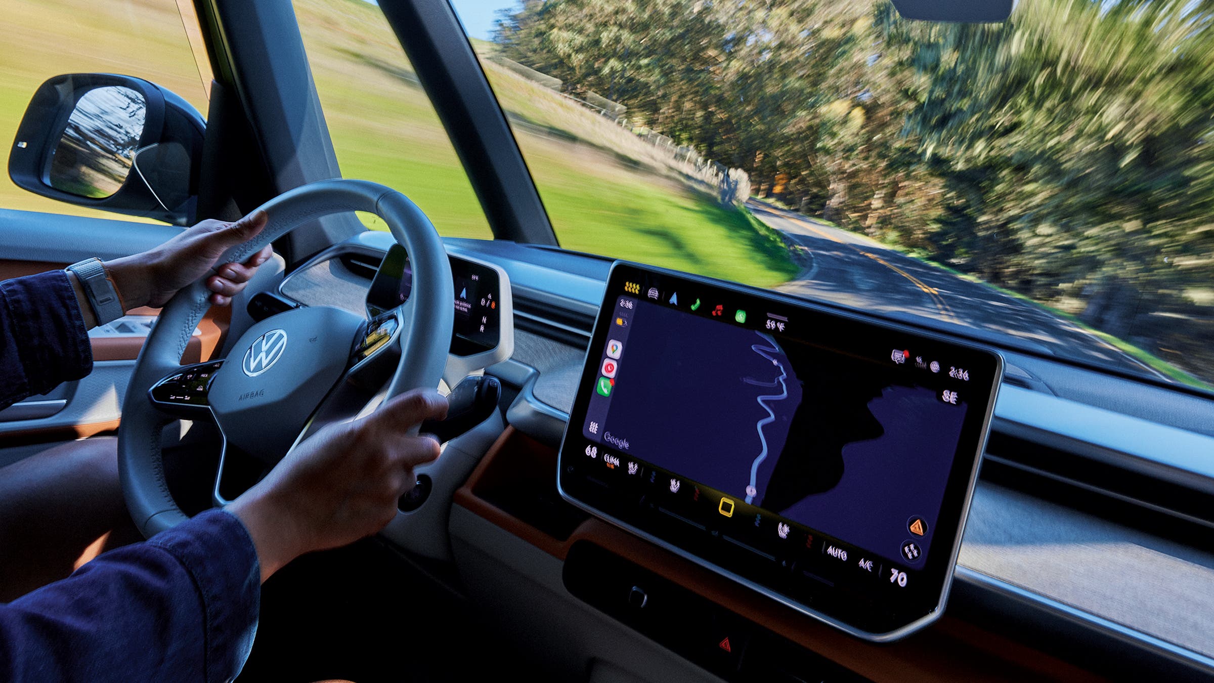 the large screen is a key feature of the interior’s clean and simple design