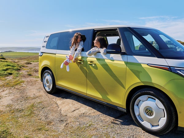 kids driving in the VW Buzz van