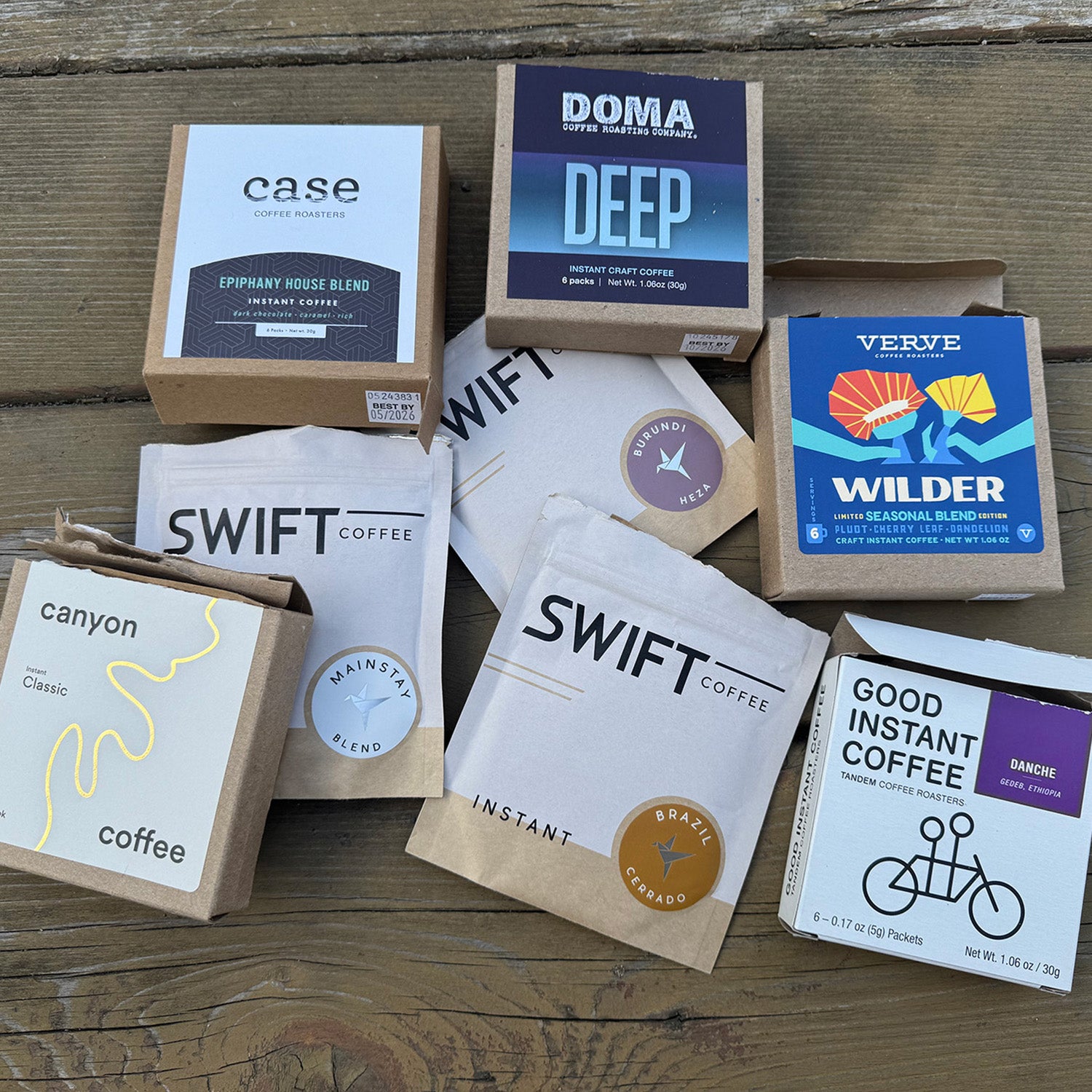 Closeup of instant coffee packs on picnic table